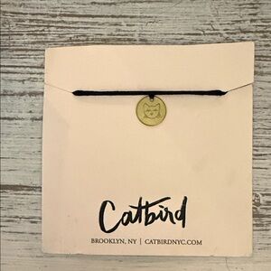 Catbird cat Charm on string